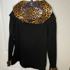 Black sweater with faux leopard print shirt underneath. XL